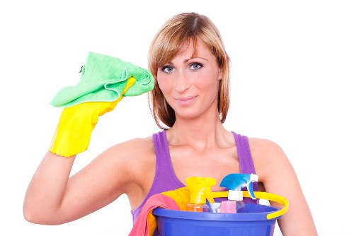 Professional cleaner presenting premium cleaning service in Knightsbridge