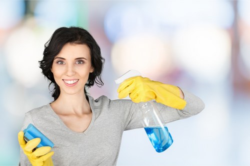 Supervisor reviewing safe cleaning practices in a workspace