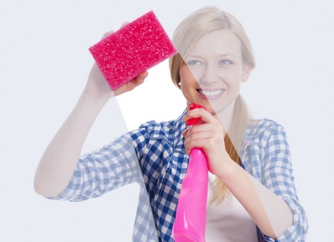 Professional cleaner maintaining a safe and tidy environment